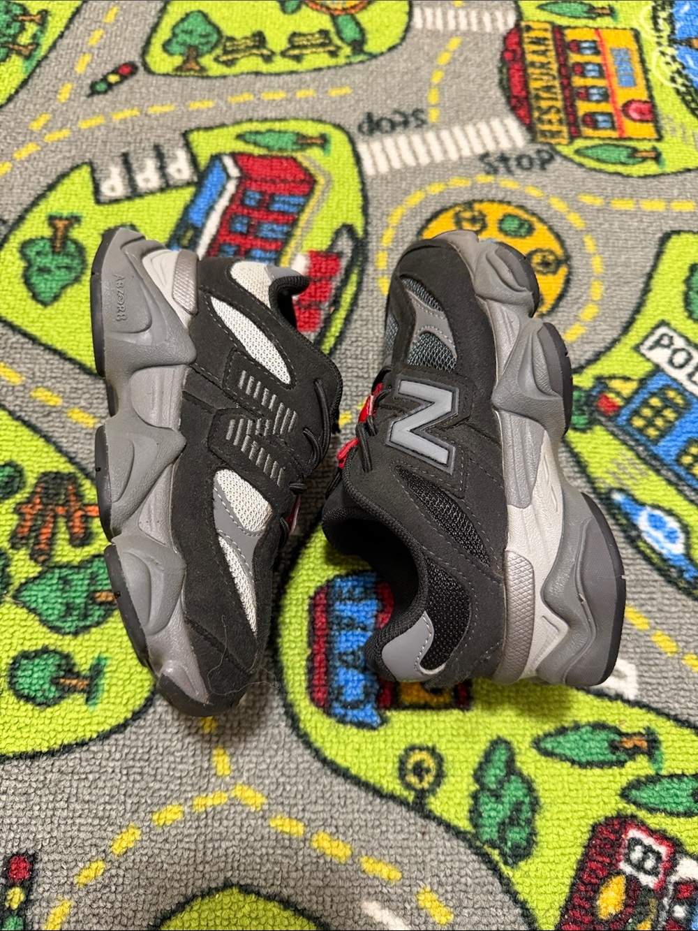 New Balance Kids Black and Gray Trail-Style Sneakers
